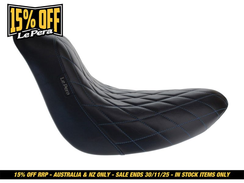 Black quilted leather motorcycle seat with blue stitching for Revelry Motorcycles.