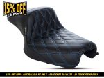 Pixelated motorcycle seat with black leather and blue stitching, suitable for motorbike customization.