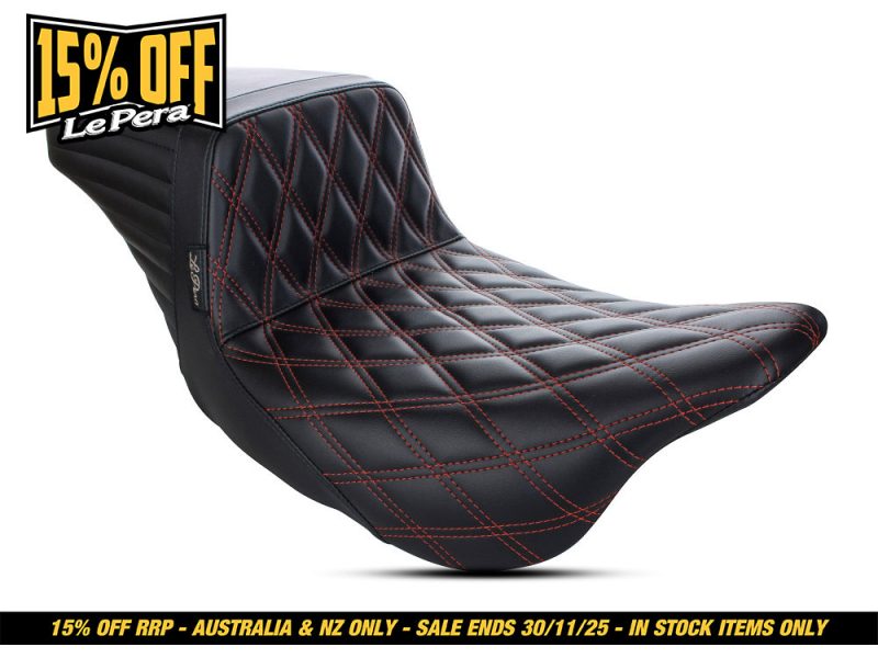 Black quilted motorcycle seat with red stitching for Revelry Motorcycles.