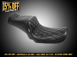 Black quilted motorcycle seat with sleek design for Revelry Motorcycles enthusiasts.