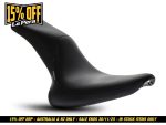Schwinn motorcycle seat for comfortable riding, durable black faux leather design.