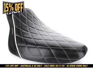 Black quilted motorcycle seat for Revelry Motorcycles, comfortable and stylish.