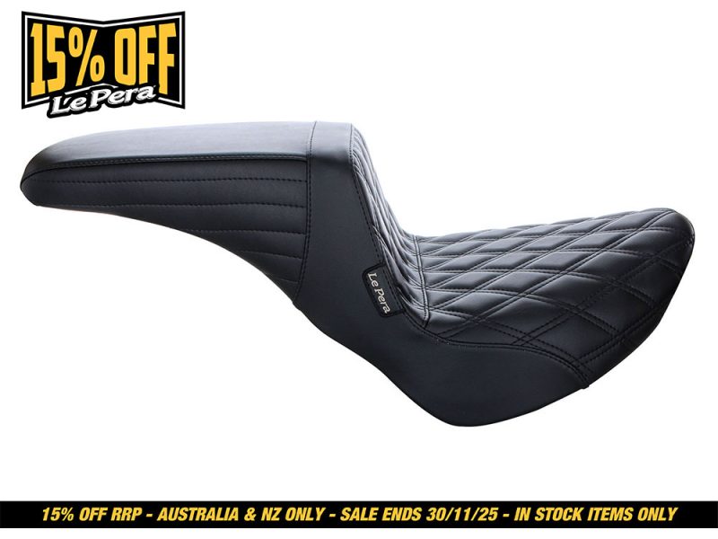 Leather motorcycle seat with diamond stitching, black upholstery, designed for comfort and style.