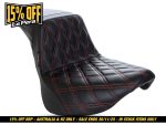 Black quilted motorcycle seat with red stitching for Revelry Motorcycles.