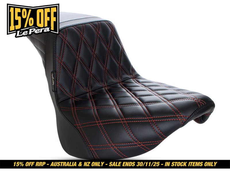 Black quilted motorcycle seat with red stitching for Revelry Motorcycles.