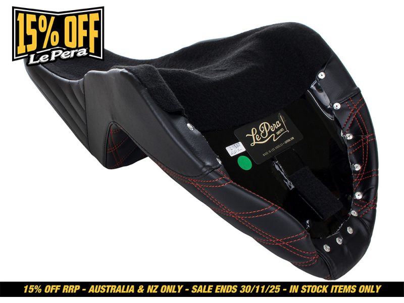 Leather motorcycle cockring seat with black padding and red stitching, ideal for Revelry Motorcycle accessories.