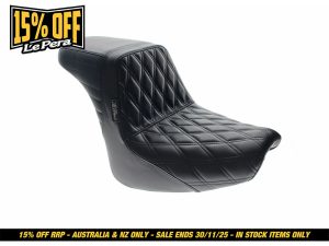 Black motorcycle seat with quilted stitching, suitable for custom touring bikes.