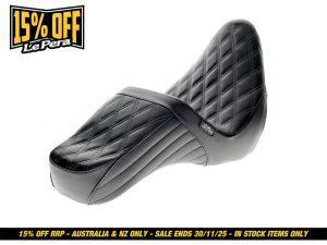 Black quilted motorcycle seat for Revelry Motorcycles, made for comfort and style.