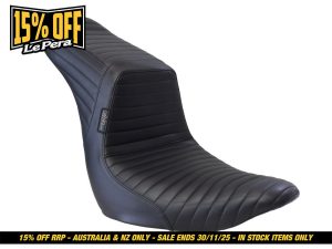 Black motorcycle seat with ribbed design, perfect for custom cruisers and touring bikes.