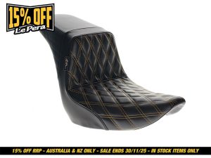 Black quilted motorcycle seat with yellow stitching for Revelry Motorcycles.