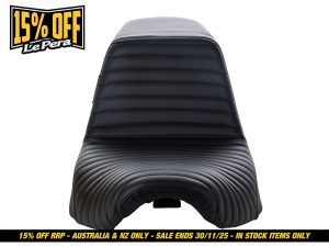 Black leather motorcycle seat for Revelry Motorcycles, stylish and durable.