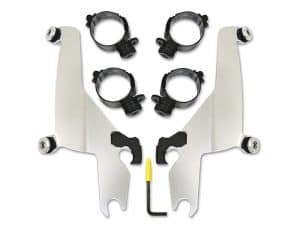 Lightweight motorcycle handlebar riser and clamp set with mounting hardware for enhanced riding control.