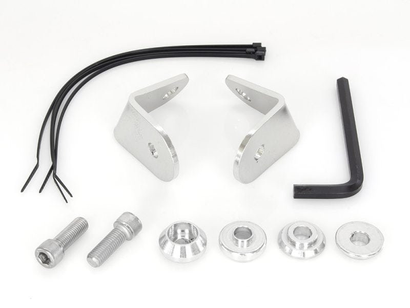 Aluminium motorcycle headlight mount kit with screws and tools for Revelry Motorcycles.