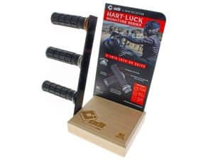 Motorcycle handlebar grips display on a wooden stand, ideal for motorcycle accessories.
