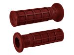 Red motorcycle handlebar grips for enhanced grip and control.