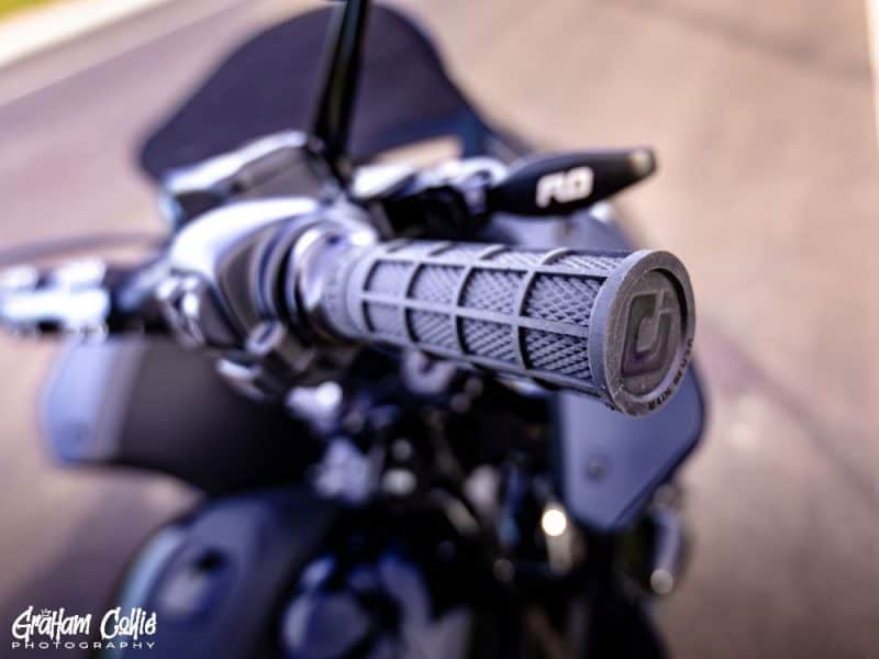 Enhanced motorcycle handlebar grip for Revelry Motorcycles, designed for durability and comfort.