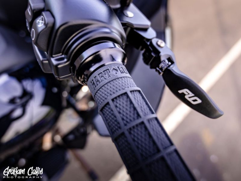Close-up of motorcycle handlebar with Harley Davidson grip and FND brake lever at Revelry Motorcycles, Sydney.
