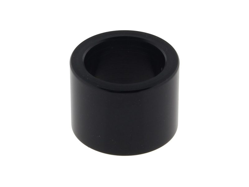 Black motorcycle rear wheel axle spacer for Revelry Motorcycles.