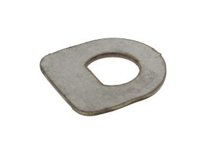 Metal motorcycle part with a worn finish and engraved shape.