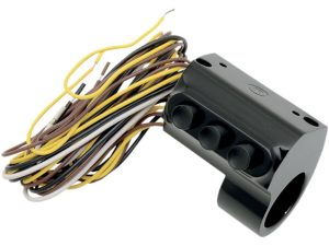 Wiring harness with black control box for motorcycle electrical system from Revelry Motorcycles.