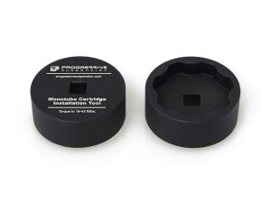 Precision motorcycle suspension tool for Monotube Cartridge installation.