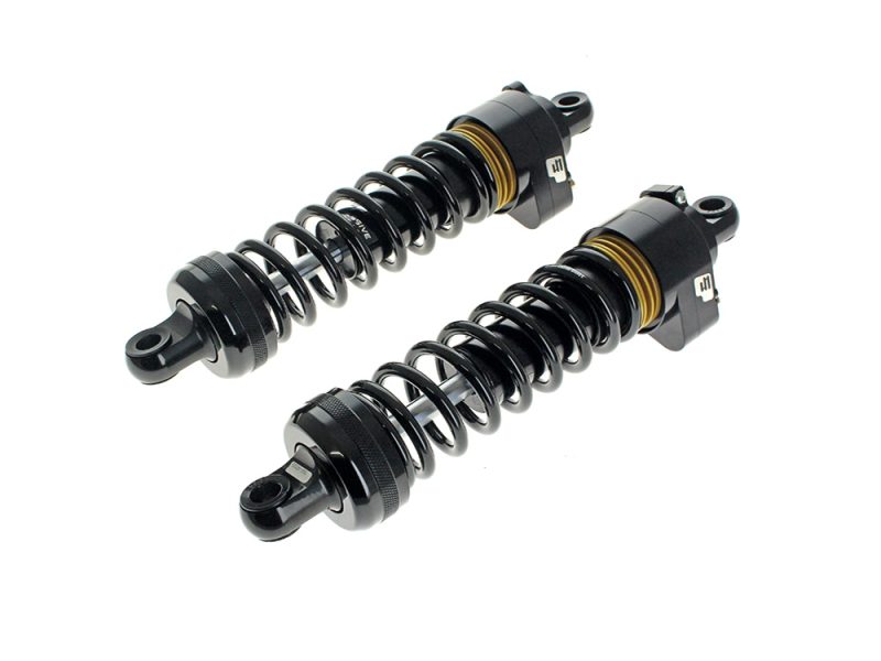 944 Series with Quik Preload System Revelry Motorcycle shock absorbers, black with gold accents, designed for enhanced suspension performance.