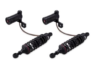 Heavy-duty motorcycle shock absorbers with air suspension and electronic control for enhanced ride quality.