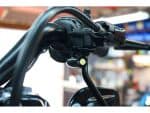 Black motorcycle handlebar and controls for Revelry Motorcycles, professional custom bike parts.