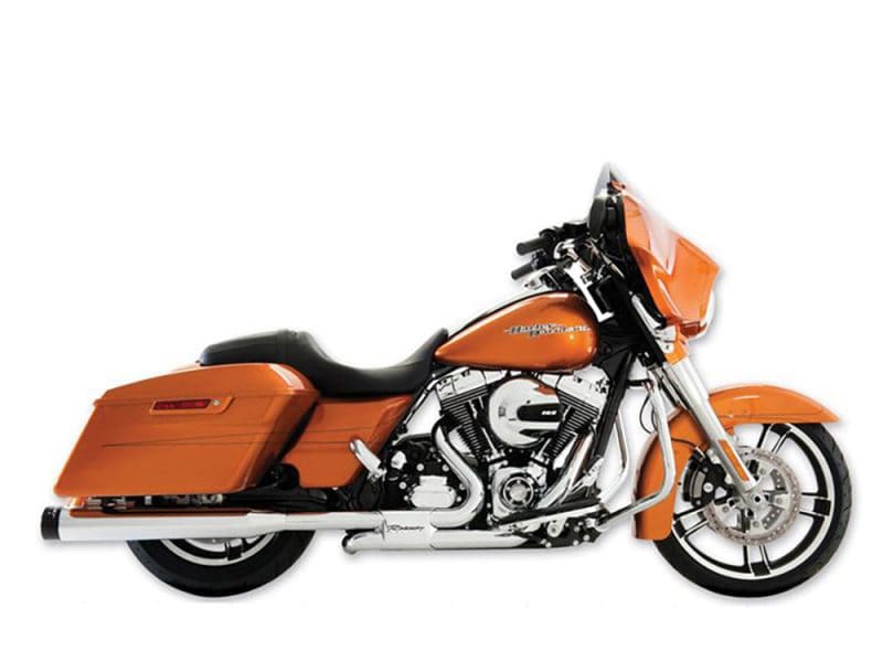 Harley-Davidson touring motorcycle in vibrant orange with black accents and spacious saddlebags.