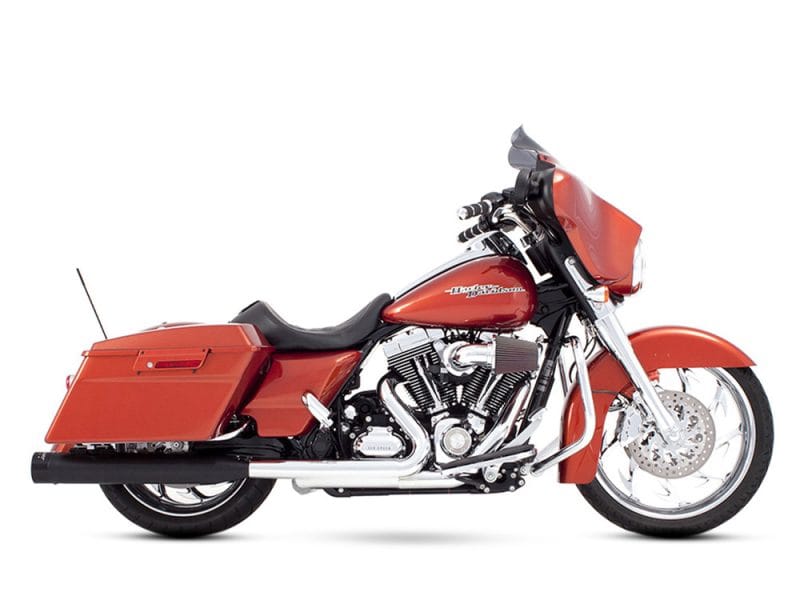 Vibrant red Harley Davidson touring motorcycle with custom exhaust and hard saddlebags.