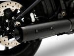 Sleek black motorcycle exhaust, high-performance racing muffler by Rinehart Racing.