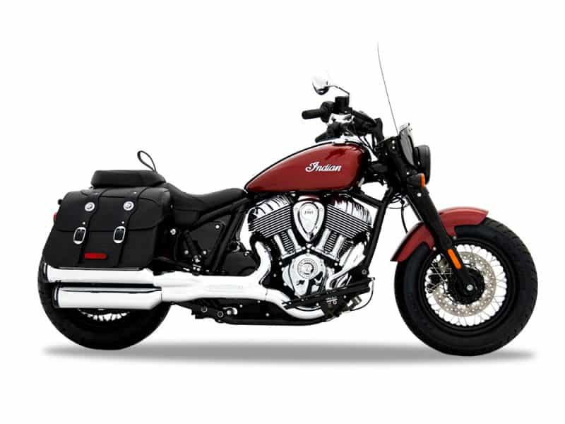4in. Slip-On Mufflers - Chrome with Black End Caps. Fits Indian Cruiser 2022up Vivid red Indian Motorcycle cruiser with black leather saddlebags and chrome engine details.