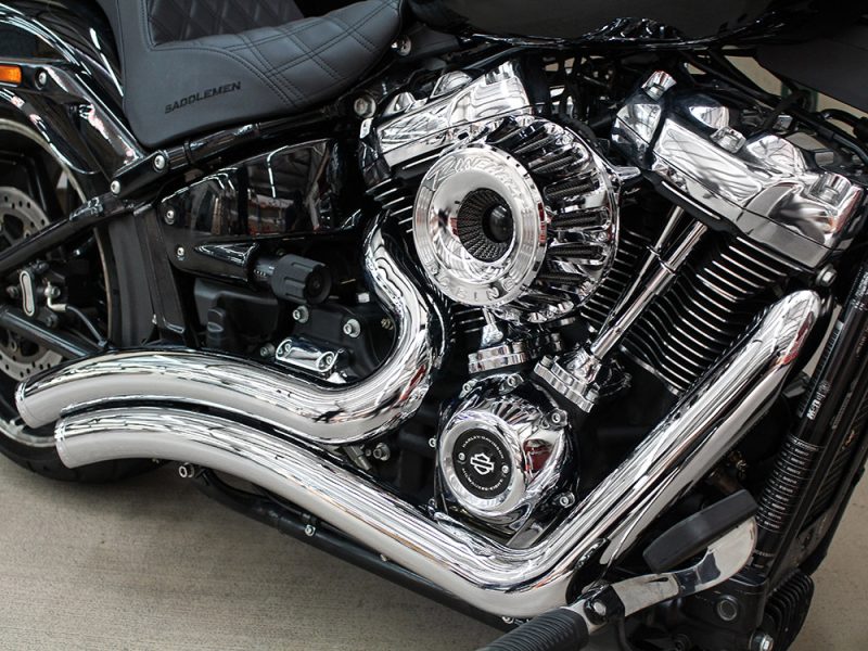 Shiny chrome Harley-Davidson motorcycle engine showcasing power and classic design.