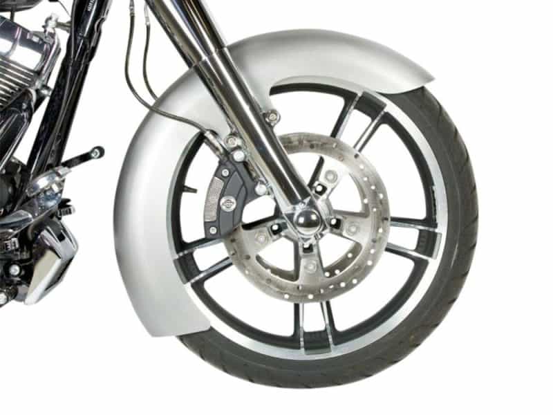 Modern motorcycle front wheel and disc brake system, showcasing high-performance riding parts.