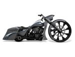 Sleek black custom motorcycle with aerodynamic design and powerful engine.