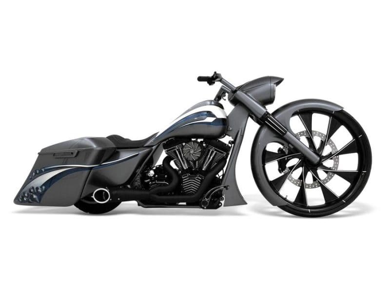 Sleek black custom motorcycle with aerodynamic design and powerful engine.