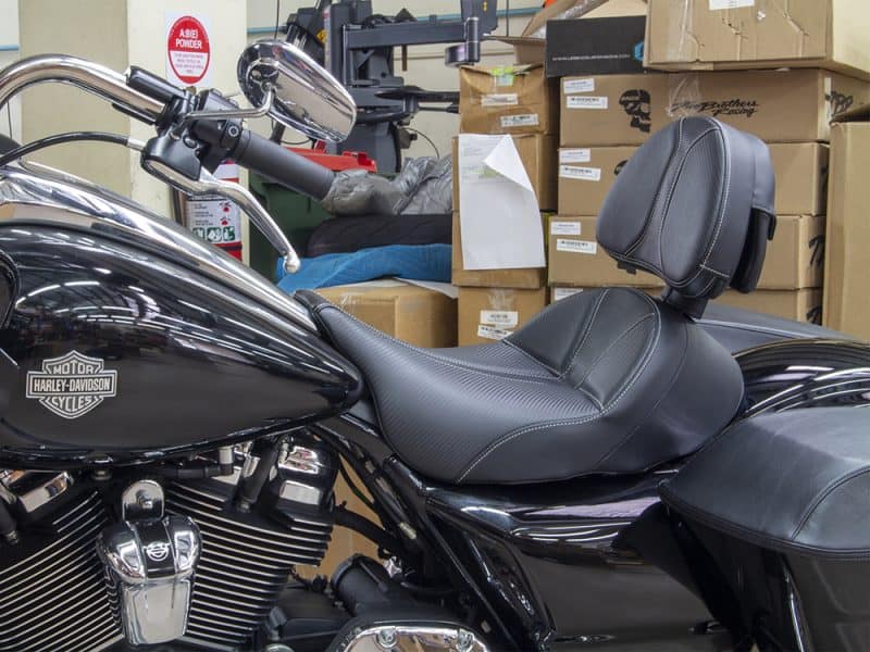 Harley-Davidson motorcycle seat and accessories at Revelry Cycles shop in Australia.