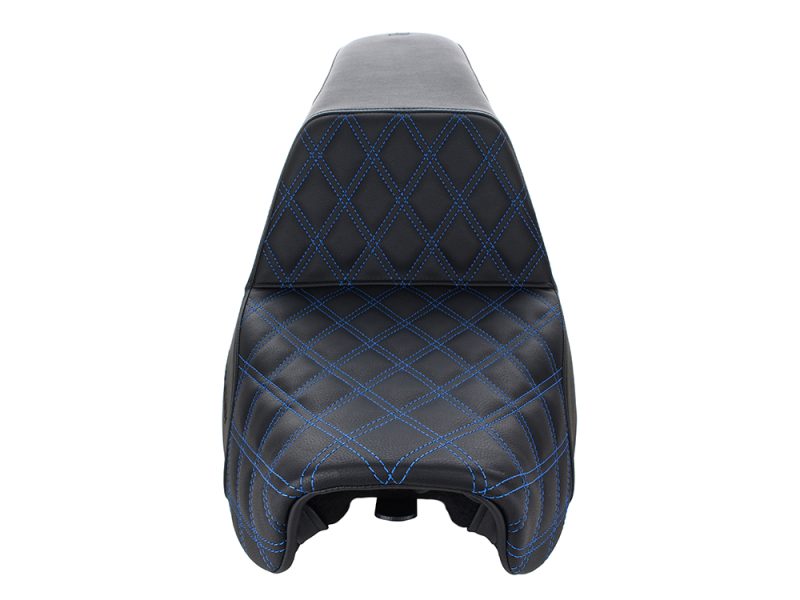 Velo seat cover with blue diamond stitching for motorcycle comfort and style.