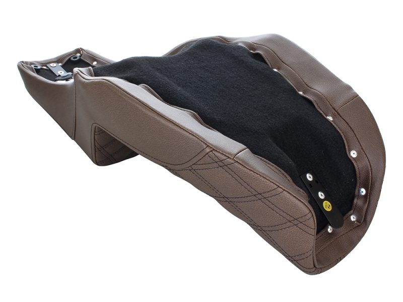 Leather motorcycle seat with black padding, designed for comfort and style by Revelry Motorcycles.