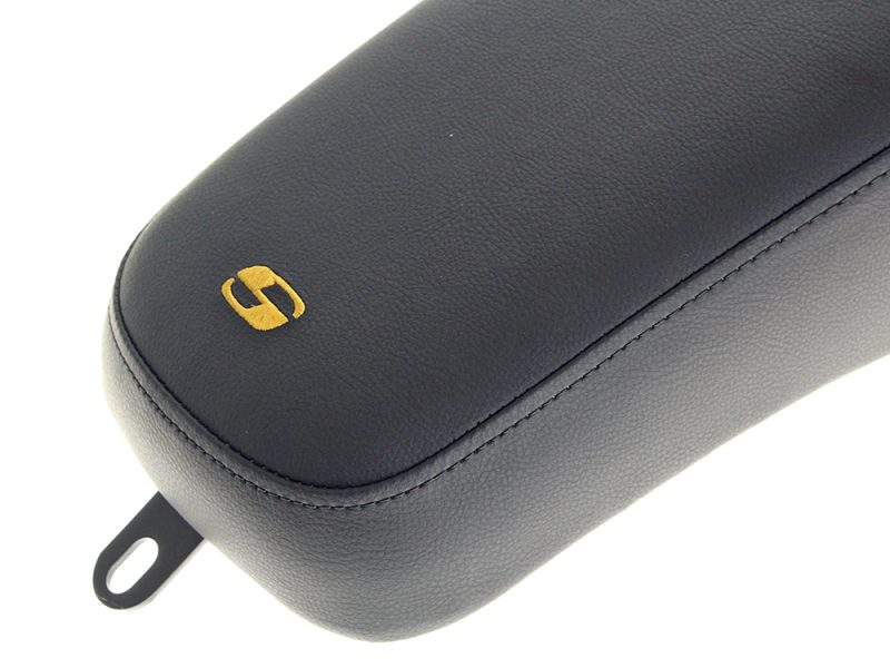 Black motorcycle accessory case with gold logo, durable design, and premium finish.