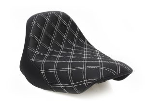 Black motorcycle seat with white plaid stitching for Revelry Motorcycles.