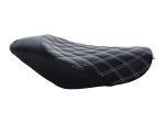 Leather motorcycle seat with diamond stitching for comfort and style.