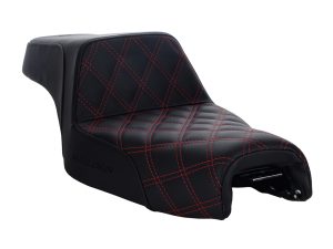Black leather motorcycle seat with red stitching, designed for Revelry Motorcycles.