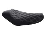 Stylish black quilted motorcycle seat for comfort and style.