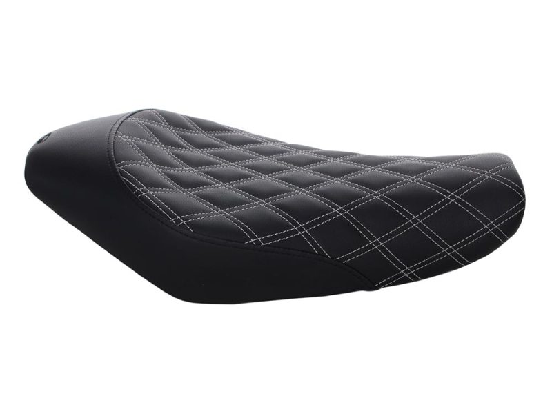 Stylish black quilted motorcycle seat for comfort and style.