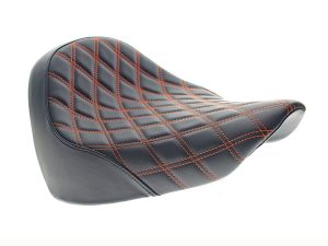 Premium black motorcycle seat with orange diamond stitching for Revelry and custom bikes.