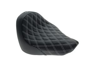 Comfortable black leather motorcycle seat with white stitch detailing, perfect for cruiser bikes.