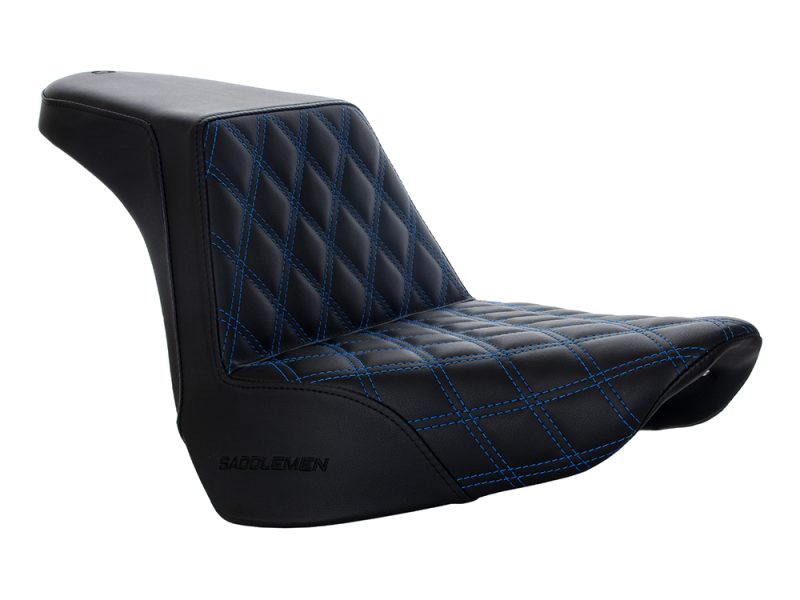 Quilted black motorcycle seat with blue stitching for Revelry Motorcycles.