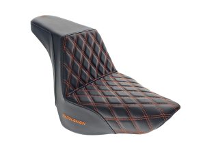 Vintage motorcycle seat with black upholstery and orange stitching, compatible with Harley Davidson Touring models.