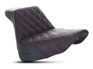Black leather motorcycle seat with red quilted stitching for custom Revelry Motorcycles.